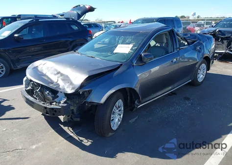 2014 Toyota Camry Le z USA, uszkodzony, nr VIN 4T4BF1FK5ER415032